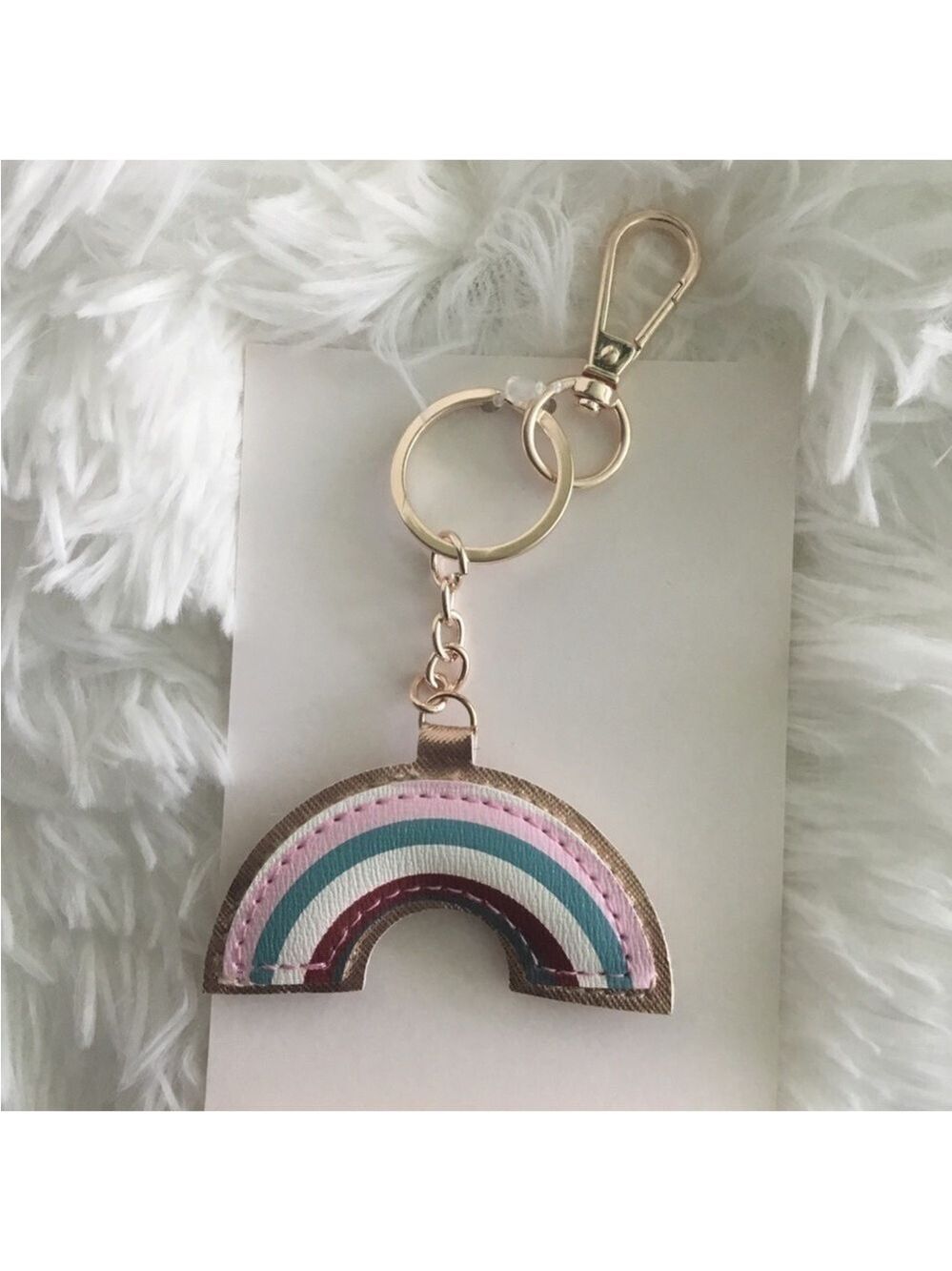 Woman’s rainbow keychain with chain and spring clip
